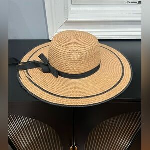 Elegant Tan Sun Hat with Black Ribbon
